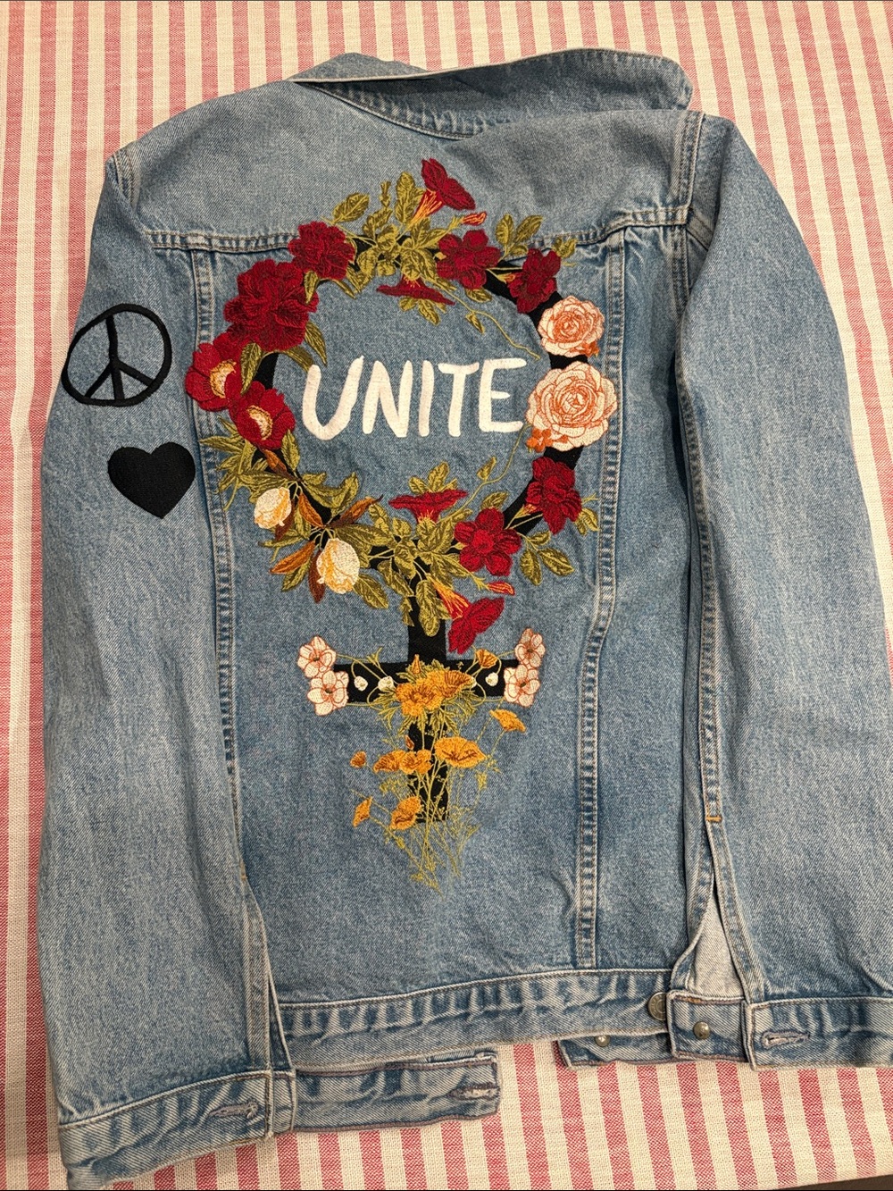 GRLFRND Light Blue Embroidered Denim Jacket with Black Sleeve Peace Patch